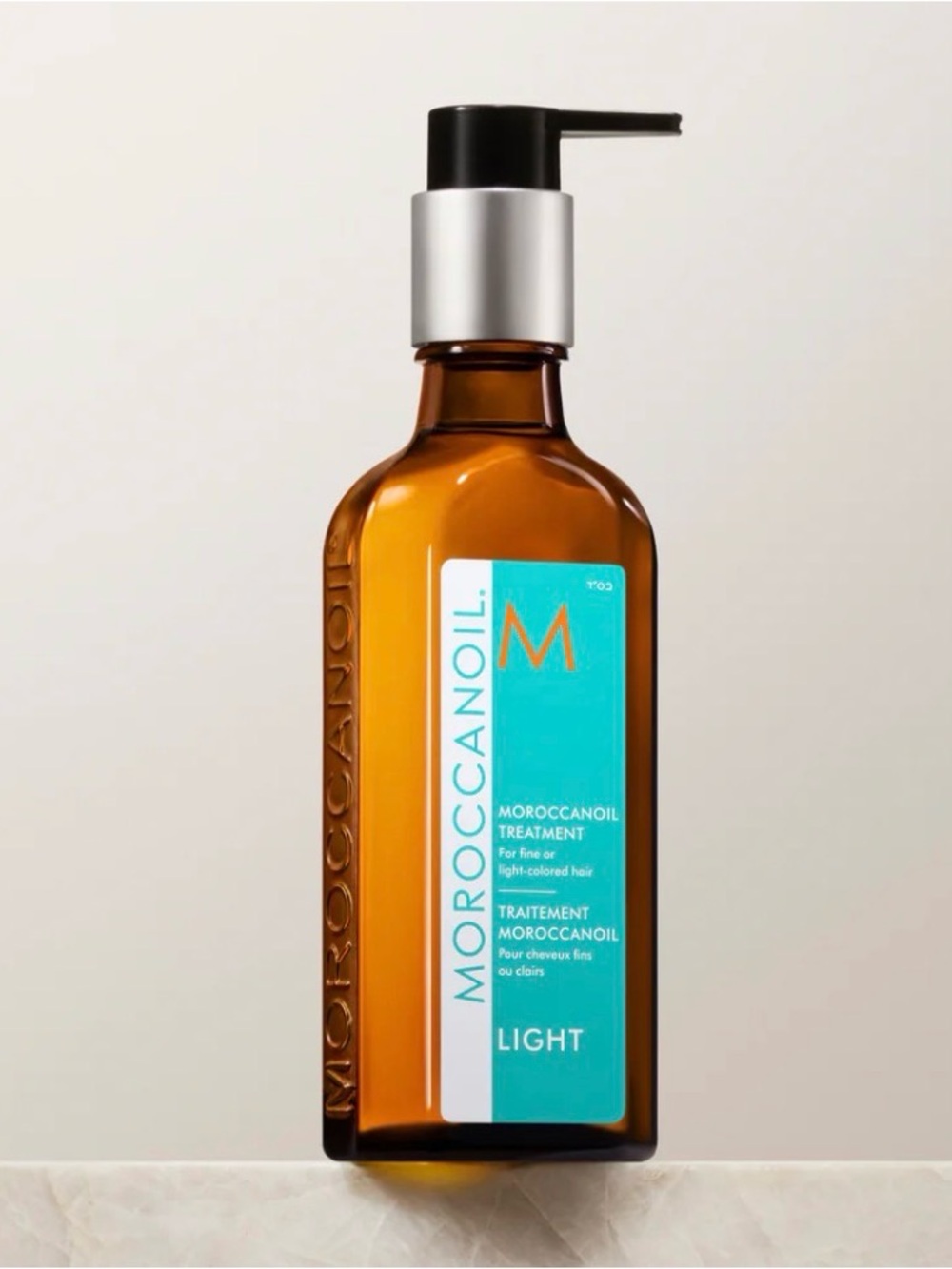 Moroccanoil Amber Bottle with Teal Label and Black Pump